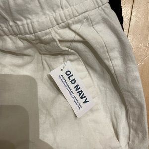 2 pairs of linen pants and 1 Silk Blouse